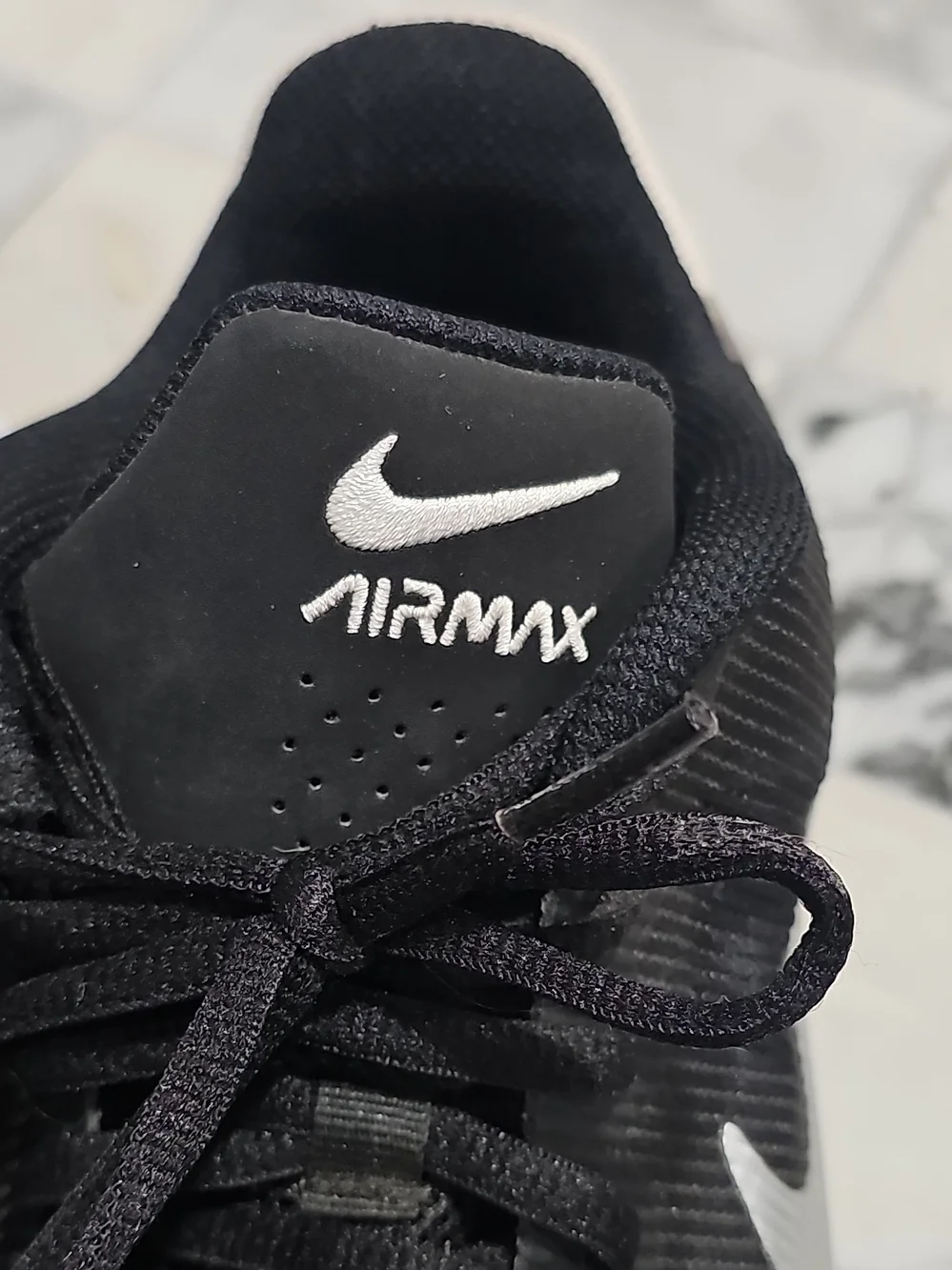 Nike AirMax Impact 4 Men’s Black and White Low-Top Athletic Sneakers